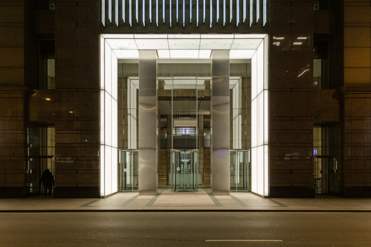 Well Lit Lobby Of Large Business Skyscraper In Downtown Chicago At Night