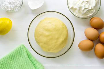 Step by step recipe of cheesecake. Finished shortbread dough in a bowl