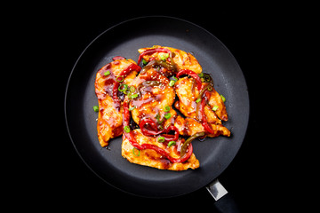 chicken teriyaki on the black plate