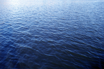 Obraz premium Waves on lake water surface.