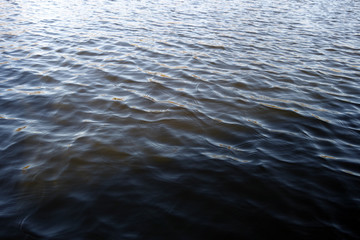 Waves on lake water surface.