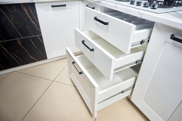 Solution for placing kitchen utensils in modern kitchen - horizontal sliding pullout drawer shelves...