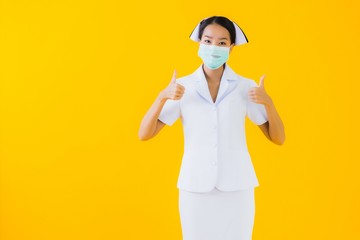 Portrait beautiful young asian woman thai nurse wear mask for protect covid19 or coronavirus