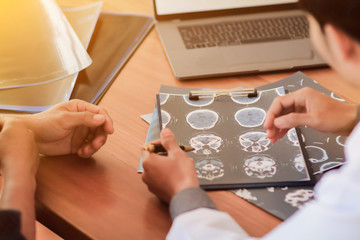 Blurred image,The doctor is diagnosing the tumor picture or cancer from the x-ray film of the...