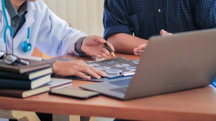 Blurred image,The doctor is diagnosing the tumor picture or cancer from the x-ray film of the...