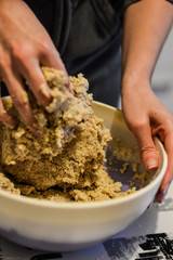mixing ingredients to make cookies dough close up