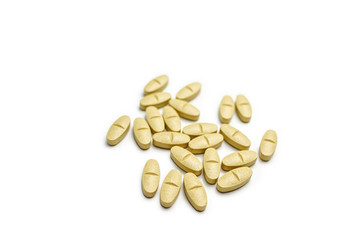 Vitamin C pill anti on white background.