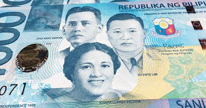 Panorama slide footage over 1000 Philippine peso. 4k detailed 3d macro capture of 1000 pesos. Macro photography footage of a fan with the front side of a Philippines  banknote. Legal tender. 