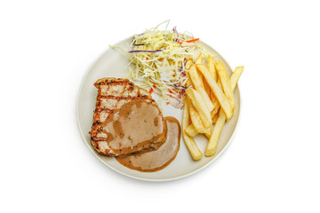 Grill pork steak with creamy pepper sauce, served with Vegetable salads and French fries on white background