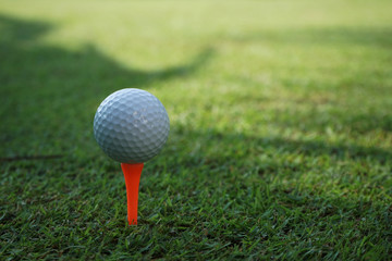 Golf ball on tee ready to be shot