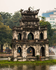 Fototapeta premium Turtle Tower in the center of Hoan Kiem Lake (Lake of the Returned Sword)