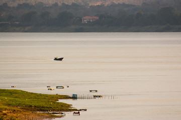  fisherman boat on mekong river, Lao