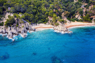 aerial top view of two coves between the cliffs
