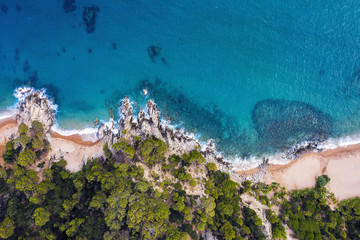 top view of the coastline with beach and coves