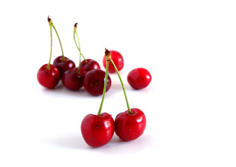 Cherries on a white background. Suitable for advertising backgrounds. Vitamin complex