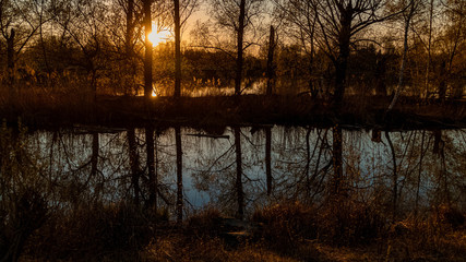 Beautiful sunset with reflections near Niederpöring, Isar, Bavaria, Germany