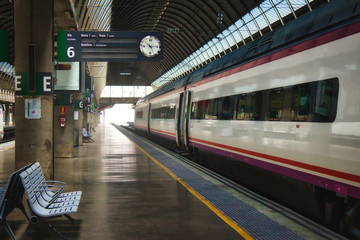 View of a train in the station from the side of the platform