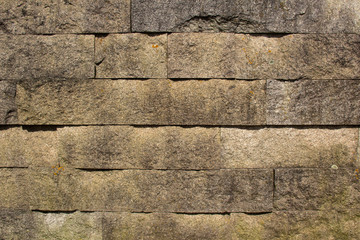 Old stone brick wall texture background