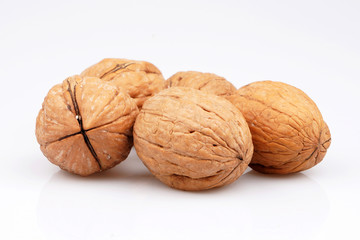 Some Organic walnut on white background