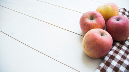 ripe apple on a wooden background