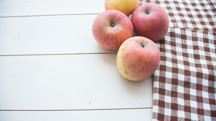 ripe apple on a wooden background