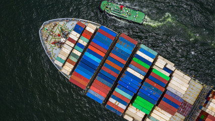 Fototapeta na wymiar Container cargo ship, Freight shipping maritime vessel, Global business import export commerce trade logistic and transportation oversea worldwide by container cargo ship boat in the open sea.