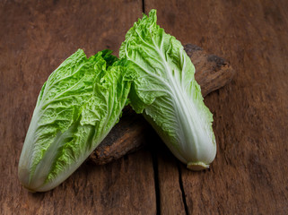 fresh chinese cabbage on old wooden table background