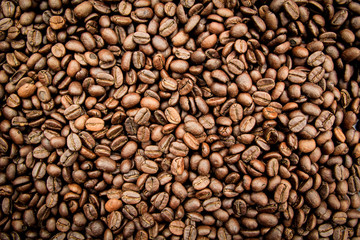 Roasted coffee beans texture background
