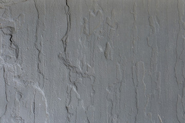 Weathered Natural Stone Wall background texture 