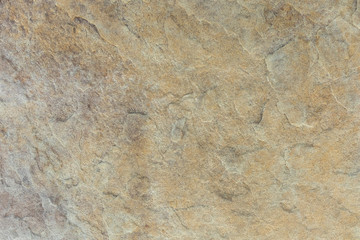 Natural Tan Stone Wall background texture 