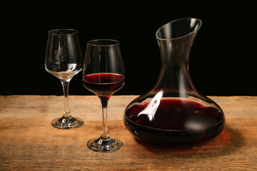 Glassware of tasty wine on table