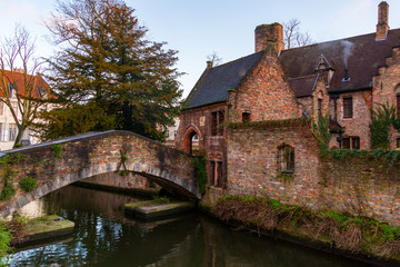 Bruges, Belgium iconic medieval houses, towers and Bonifacius Bridge. Classic postcard view of the historic city center. Often referred to as The Venice of the North. West Flanders province, Belgium.