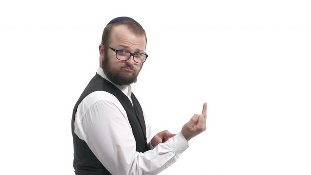 Side view of handsome Jewish man showing middle finger. Guy demonstrating fuck you sign, offensive gesture. Isolated, on white background