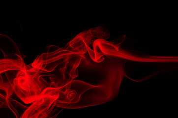 Fototapeta premium Red smoke on black background, fire design
