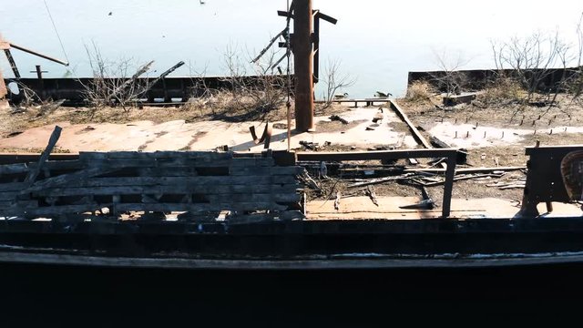 Longer full length flyby alongside a rusty shipwreck