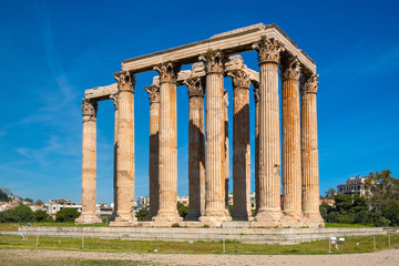 Fototapeta premium Panoramic view of Temple of Olympian Zeus, known as Olympieion at Leof Andrea Siggrou street in ancient city center old town borough in Athens, Greece