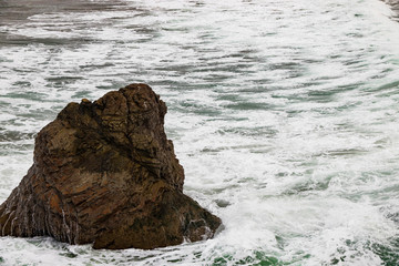 Waves breaking on the California coastline