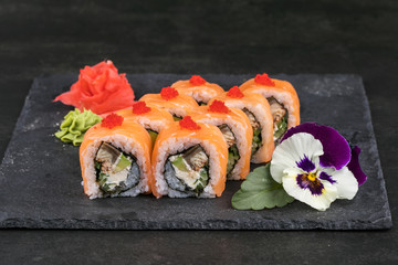 japanese sushi food. Maki ands rolls with tuna, salmon, shrimp, crab and avocado.