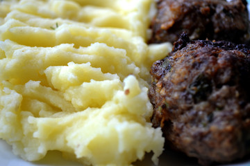 Mashed potatoes with meatballs. Home made food.