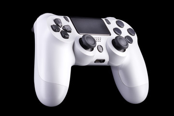 White video game joystick gamepad isolated on a black background