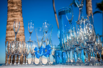 Margarita cocktails, lemonade and champagne sparkling wine glasses on beach outdoor catering event 