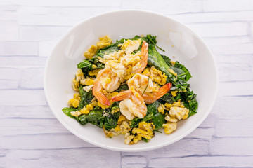 Stir-fried Malindjo leaves with egg
