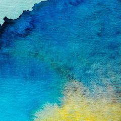 Abstract hand painted watercolor background. Blue, yellow and purple shades