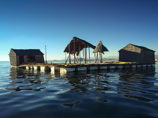 Small Tourist House Built of Straw on a Floating Island in Lake Titicaca in Puerto Perez, La Paz / Bolivia