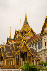 Fototapeta premium Detail of some roofs decorated in gold in the grand palace of Bangkok