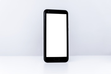 black cell phone with blank screen and background to fill