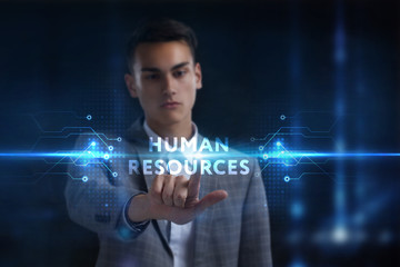 Fototapeta na wymiar Business, Technology, Internet and network concept. Young businessman working on a virtual screen of the future and sees the inscription: Human resources