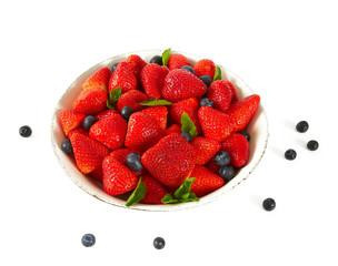 fresh strawberries and blueberries isolated no white