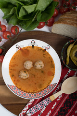 Top view of plate with meatballs soup, traditional plate of the Romanian cuisine,ciorba de perisoare