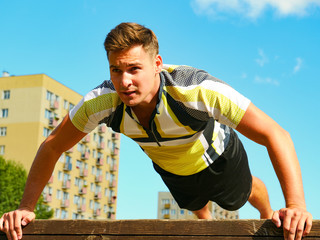 Man doing push ups outdoor